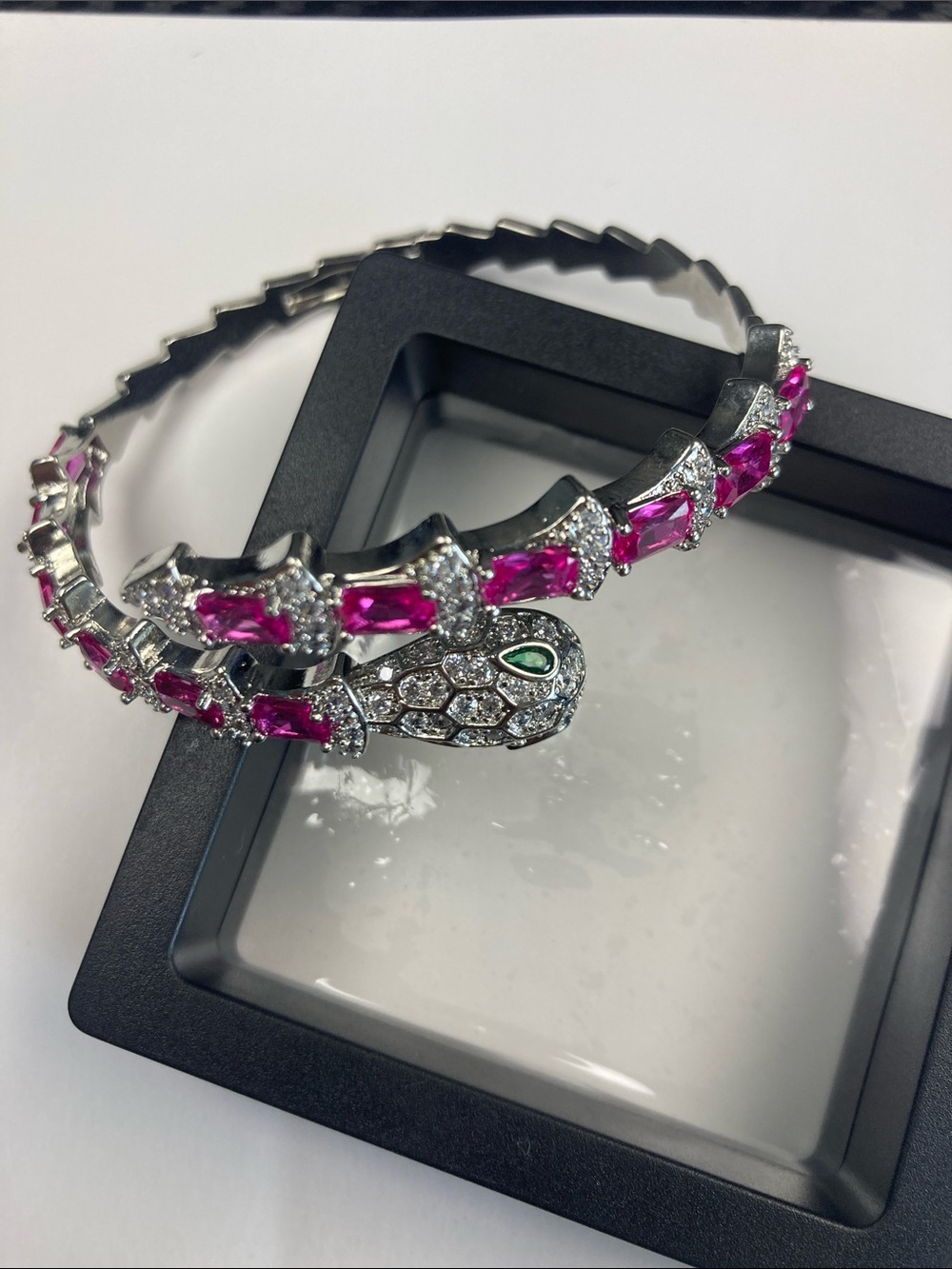 Silver Snake-Head Bangle with Pink Gemstones